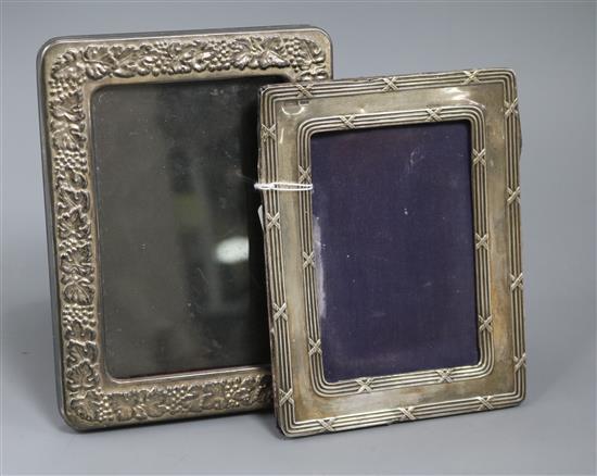 An Edwardian silver photograph frame, A & J Zimmerman, Birmingham, 1904 and one other plated photograph frame. Another frame